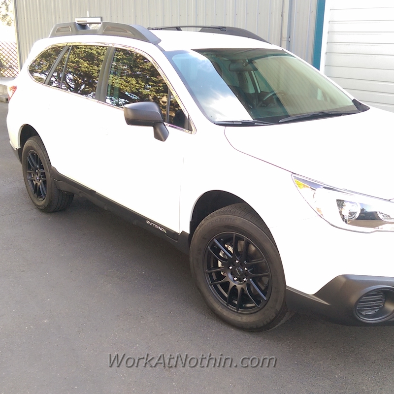 New rims and stock tires.