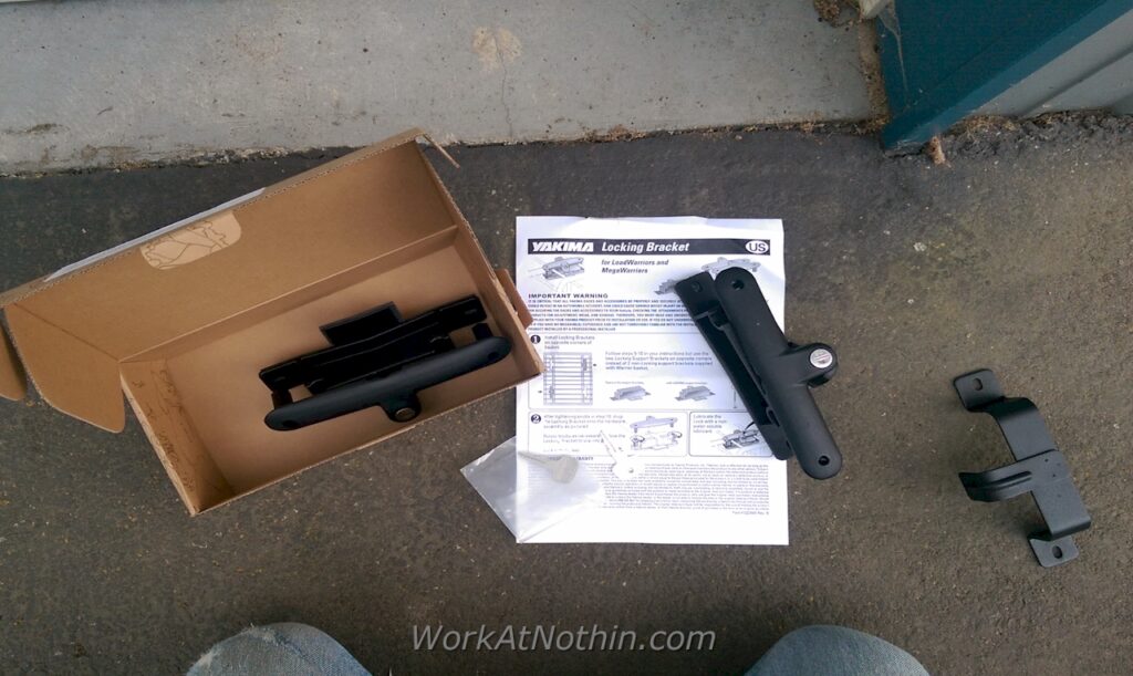 Yakima locking bracket parts unboxed.