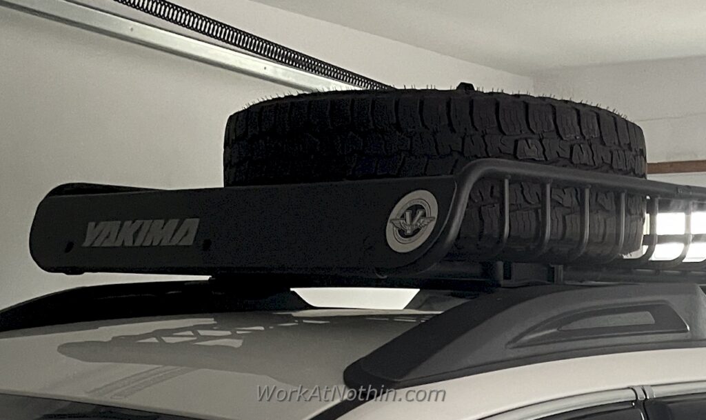 Our spare tire secured to the roof basket.